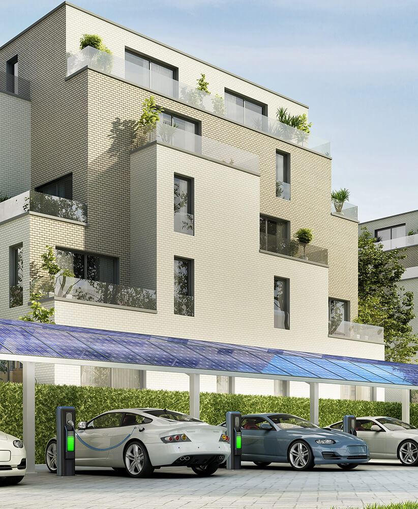 Aerial view of business complex rooftops with solar panels