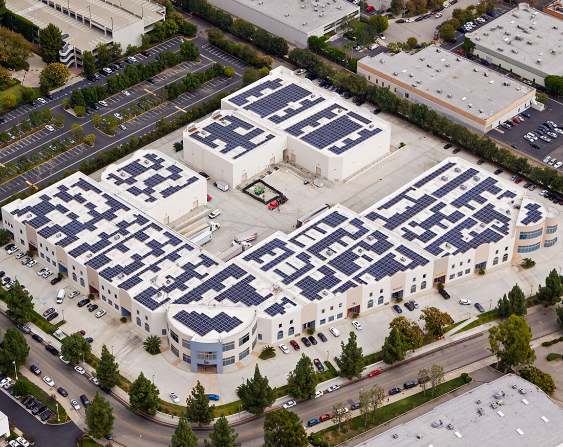 Aerial view of business complex with solar panels