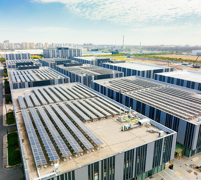 Multiple solar fields built on top of commercial building roofs